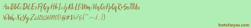 SilhouettoScript Font – Brown Fonts on Green Background