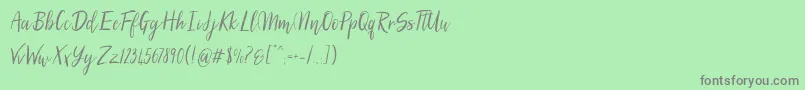 SilhouettoScript Font – Gray Fonts on Green Background