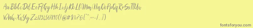 SilhouettoScript Font – Gray Fonts on Yellow Background