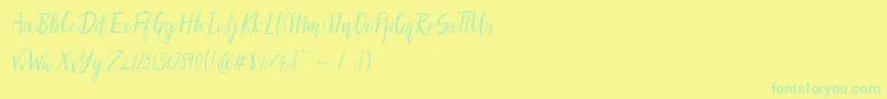 フォントSilhouettoScript – 黄色い背景に緑の文字