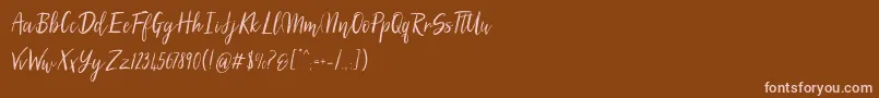 SilhouettoScript-Schriftart – Rosa Schriften auf braunem Hintergrund