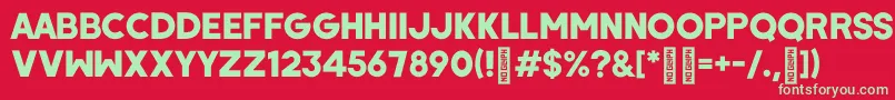 WombyRegular-Schriftart – Grüne Schriften auf rotem Hintergrund