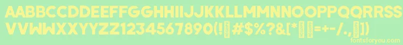 WombyRegular Font – Yellow Fonts on Green Background