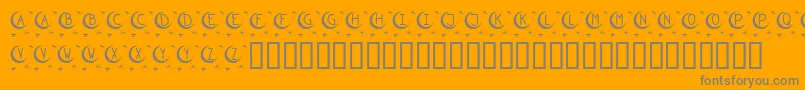 KrTwinkle-Schriftart – Graue Schriften auf orangefarbenem Hintergrund