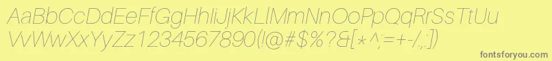 フォントAileronUltralightitalic – 黄色の背景に灰色の文字