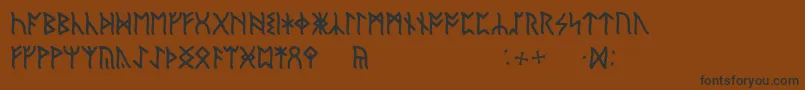 フォントEnglishRunic – 黒い文字が茶色の背景にあります