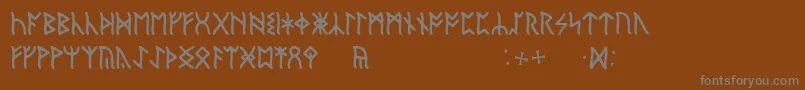 Czcionka EnglishRunic – szare czcionki na brązowym tle