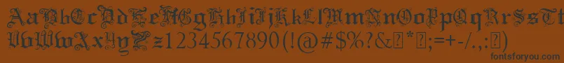 Шрифт PaulsSwirlyGothicFont – чёрные шрифты на коричневом фоне