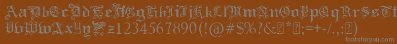 fuente PaulsSwirlyGothicFont – Fuentes Grises Sobre Fondo Marrón