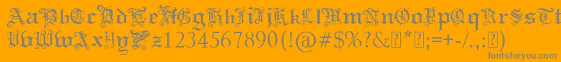 PaulsSwirlyGothicFont-Schriftart – Graue Schriften auf orangefarbenem Hintergrund