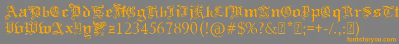 PaulsSwirlyGothicFont-fontti – oranssit fontit harmaalla taustalla