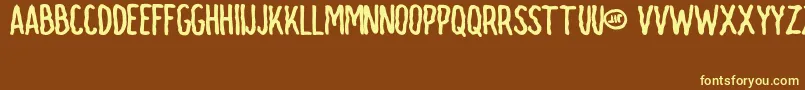 Jit Font – Yellow Fonts on Brown Background