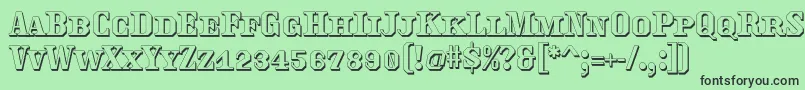 Traktoretkaoutline Font – Black Fonts on Green Background