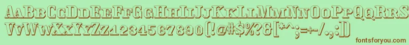 Traktoretkaoutline Font – Brown Fonts on Green Background