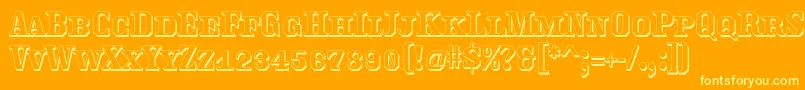 Traktoretkaoutline Font – Yellow Fonts on Orange Background