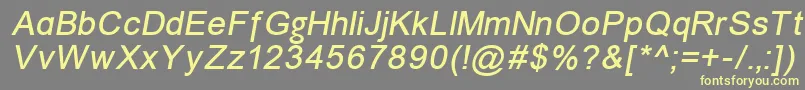 ErUniversKoi8Italic-Schriftart – Gelbe Schriften auf grauem Hintergrund