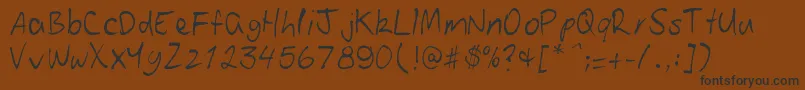 Patoskript Font – Black Fonts on Brown Background