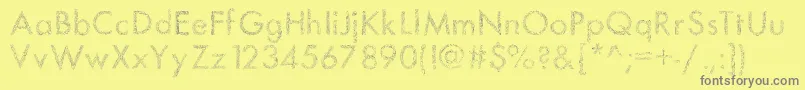 Saiba mais sobre a fonte Drawman Fonte Drawman – fontes cinzas em um fundo amarelo