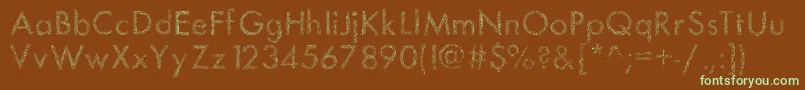 Drawman Font – Green Fonts on Brown Background