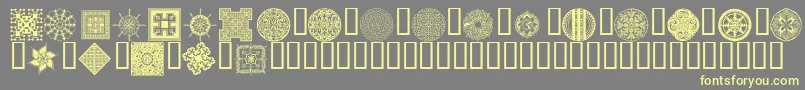 Wmdesigns2 Font – Yellow Fonts on Gray Background