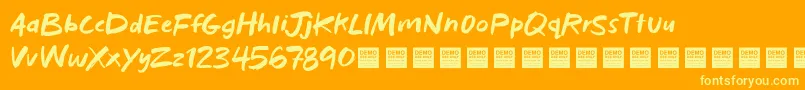 Fonte BadHabitsDemo – fontes amarelas em um fundo laranja