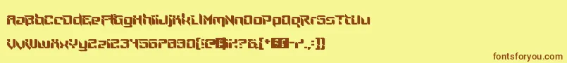 フォントNinjaThing – 茶色の文字が黄色の背景にあります。