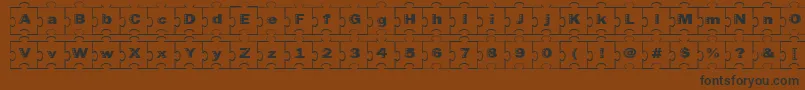 フォントFailedfont2jigsaw – 黒い文字が茶色の背景にあります