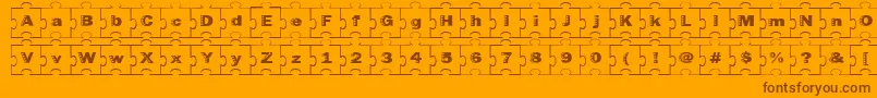 Failedfont2jigsaw-Schriftart – Braune Schriften auf orangefarbenem Hintergrund