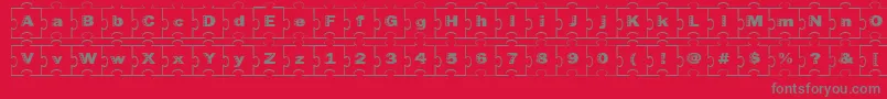Więcej informacji o czcionce Failedfont2jigsaw Czcionka Failedfont2jigsaw – szare czcionki na czerwonym tle
