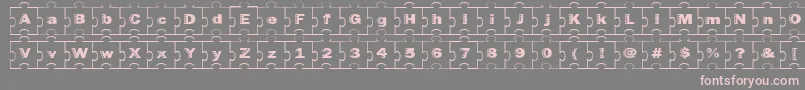 Czcionka Failedfont2jigsaw – różowe czcionki na szarym tle