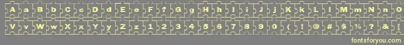 Fonte Failedfont2jigsaw – fontes amarelas em um fundo cinza