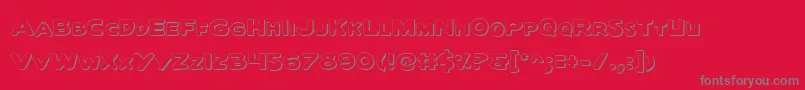 QuartermainOutline-Schriftart – Graue Schriften auf rotem Hintergrund