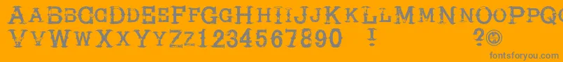 Hireacowboy-Schriftart – Graue Schriften auf orangefarbenem Hintergrund