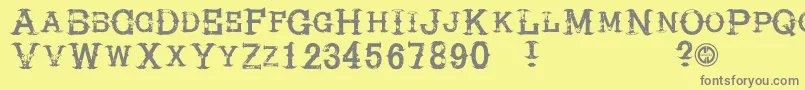 フォントHireacowboy – 黄色の背景に灰色の文字