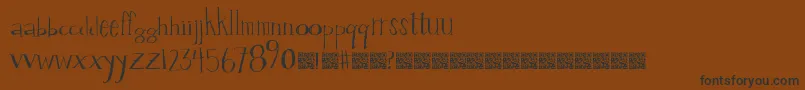 fuente Valuestamp – Fuentes Negras Sobre Fondo Marrón