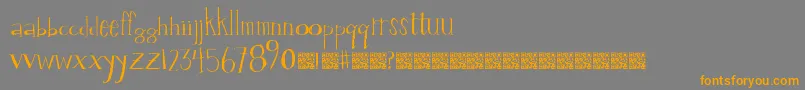 フォントValuestamp – オレンジの文字は灰色の背景にあります。