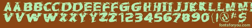 Hallowienthetramps Font – Green Fonts on Brown Background