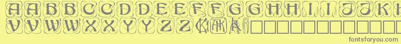 Fonte Konanur – fontes cinzas em um fundo amarelo