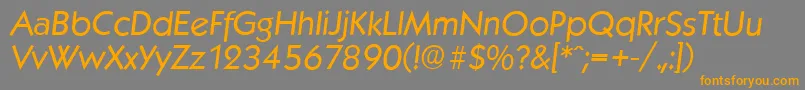 フォントKoblenzserialItalic – オレンジの文字は灰色の背景にあります。