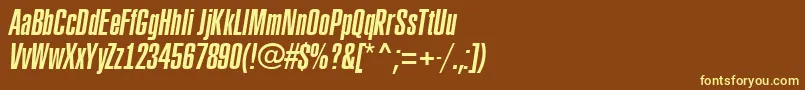 ARubricaxtcnItalic-fontti – keltaiset fontit ruskealla taustalla