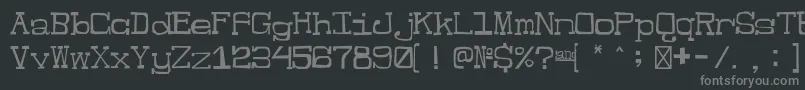 フォントJesterRegular – 黒い背景に灰色の文字