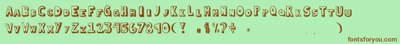 Blockedin Font – Brown Fonts on Green Background