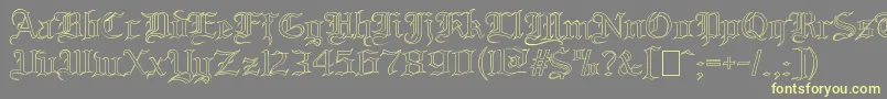 BloodandbladeOutilne Font – Yellow Fonts on Gray Background