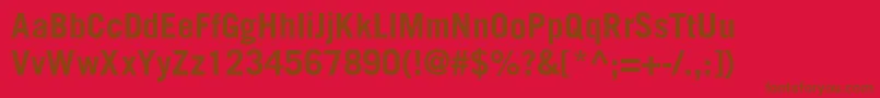 TransfergothicBold-Schriftart – Braune Schriften auf rotem Hintergrund