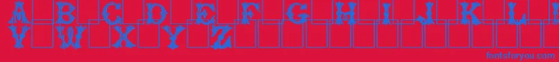 Trefoilcapitals Font – Blue Fonts on Red Background