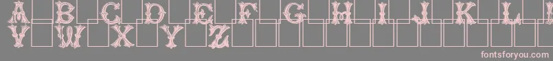 Trefoilcapitals-fontti – vaaleanpunaiset fontit harmaalla taustalla