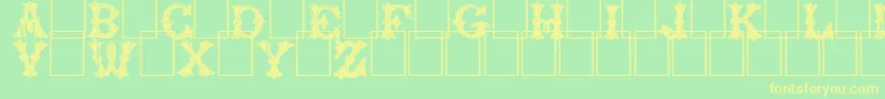 Trefoilcapitals Font – Yellow Fonts on Green Background