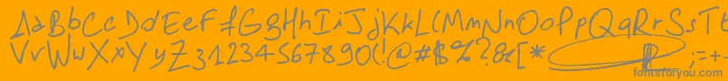 Samdam-Schriftart – Graue Schriften auf orangefarbenem Hintergrund
