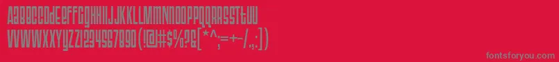 Triac71-fontti – harmaat kirjasimet punaisella taustalla