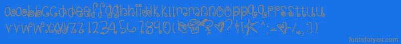 フォントSweetmemories – 青い背景に灰色の文字